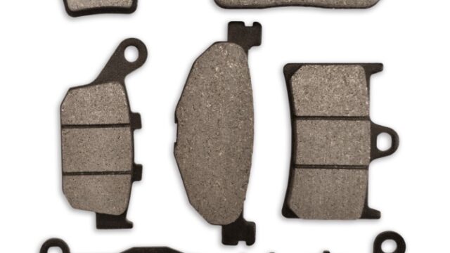 Seven Brenta organic brake pads in different shapes.