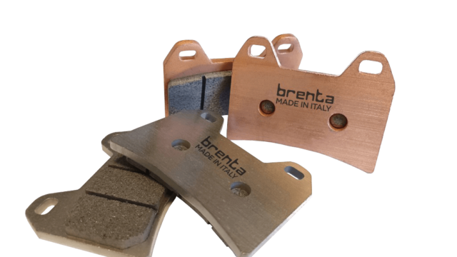 Two Brenta ceramic racing brake pads alongside two Brenta sintered-pro brake pads.